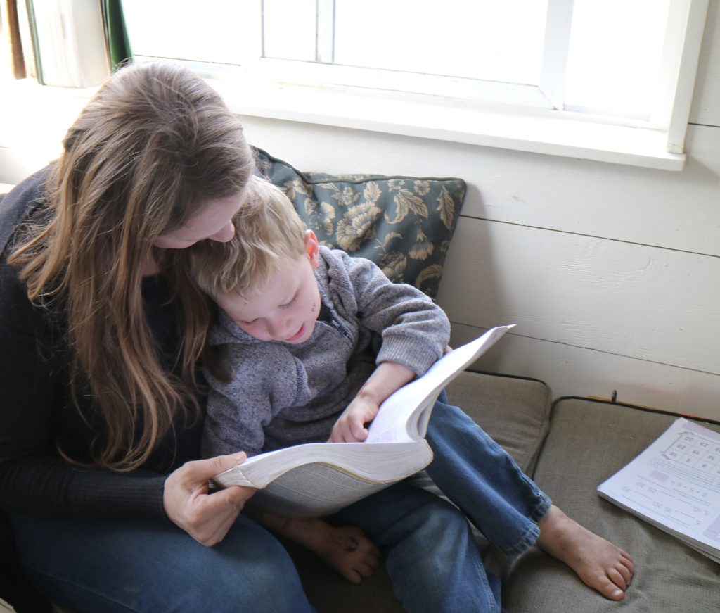 mom and child practicing reading